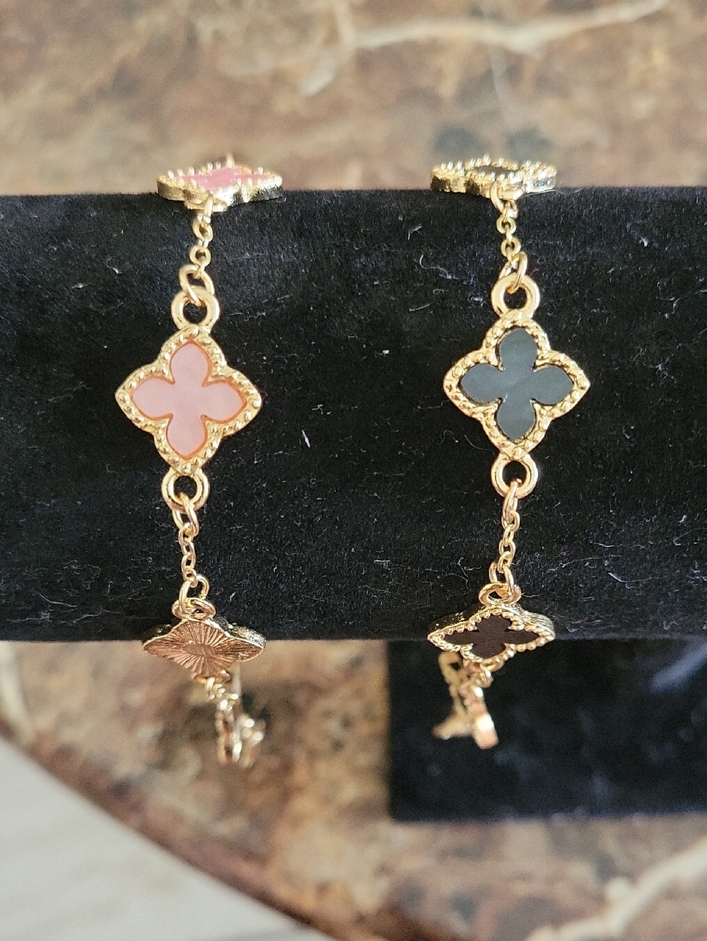 Gold-Tone Clover Link Bracelet with Pink and Black Accents